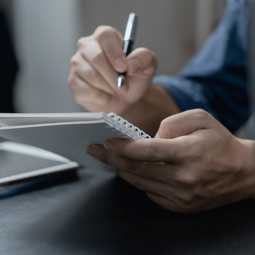 Dyslexic student taking handwritten notes
